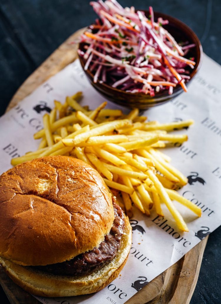 photo of burger beside fries