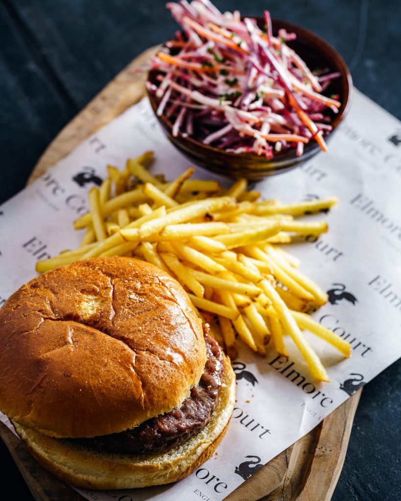 photo of burger beside fries